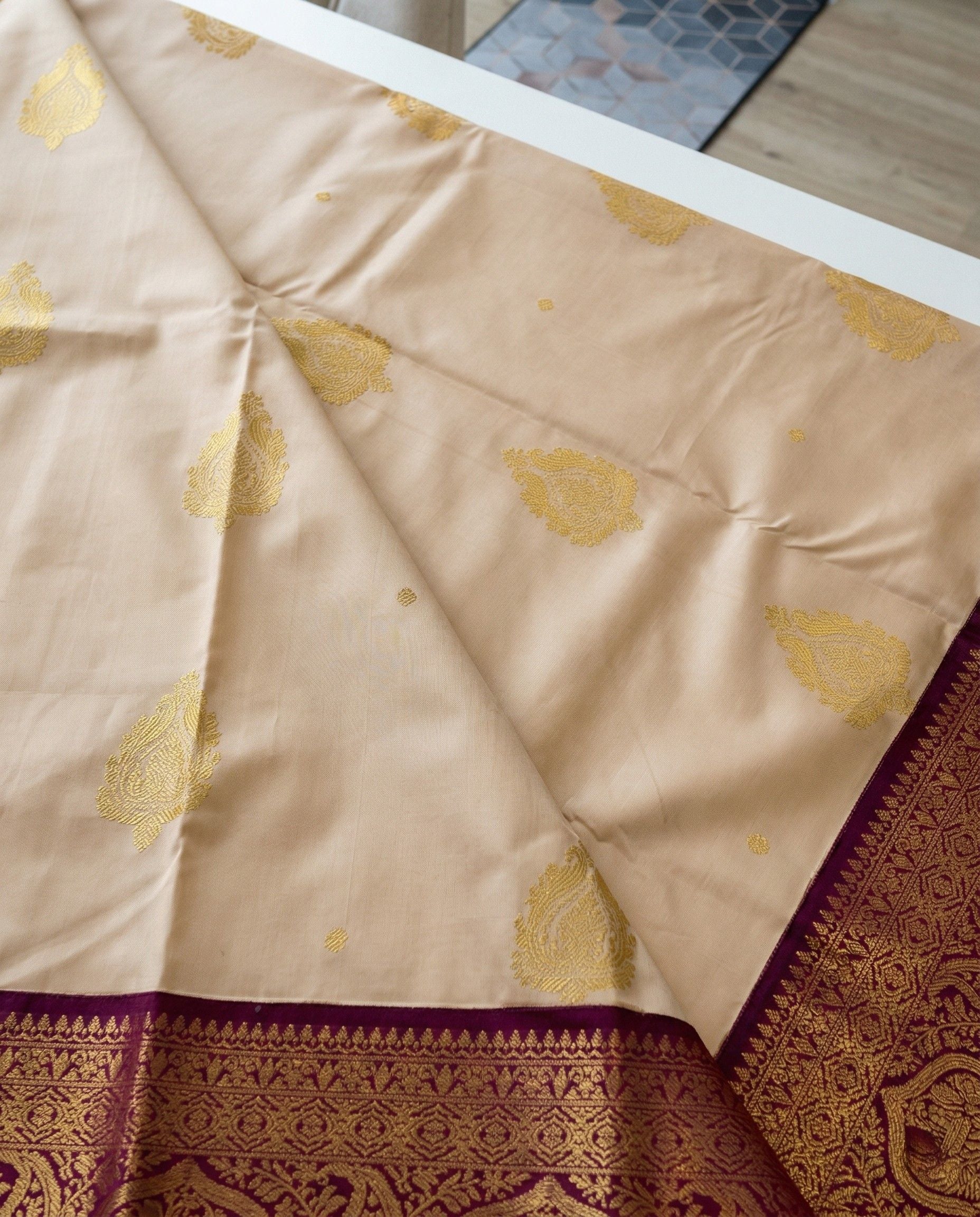 Zeenat - Royal Cream Kanjivaram Saree With Maroon Elephant Zari Border