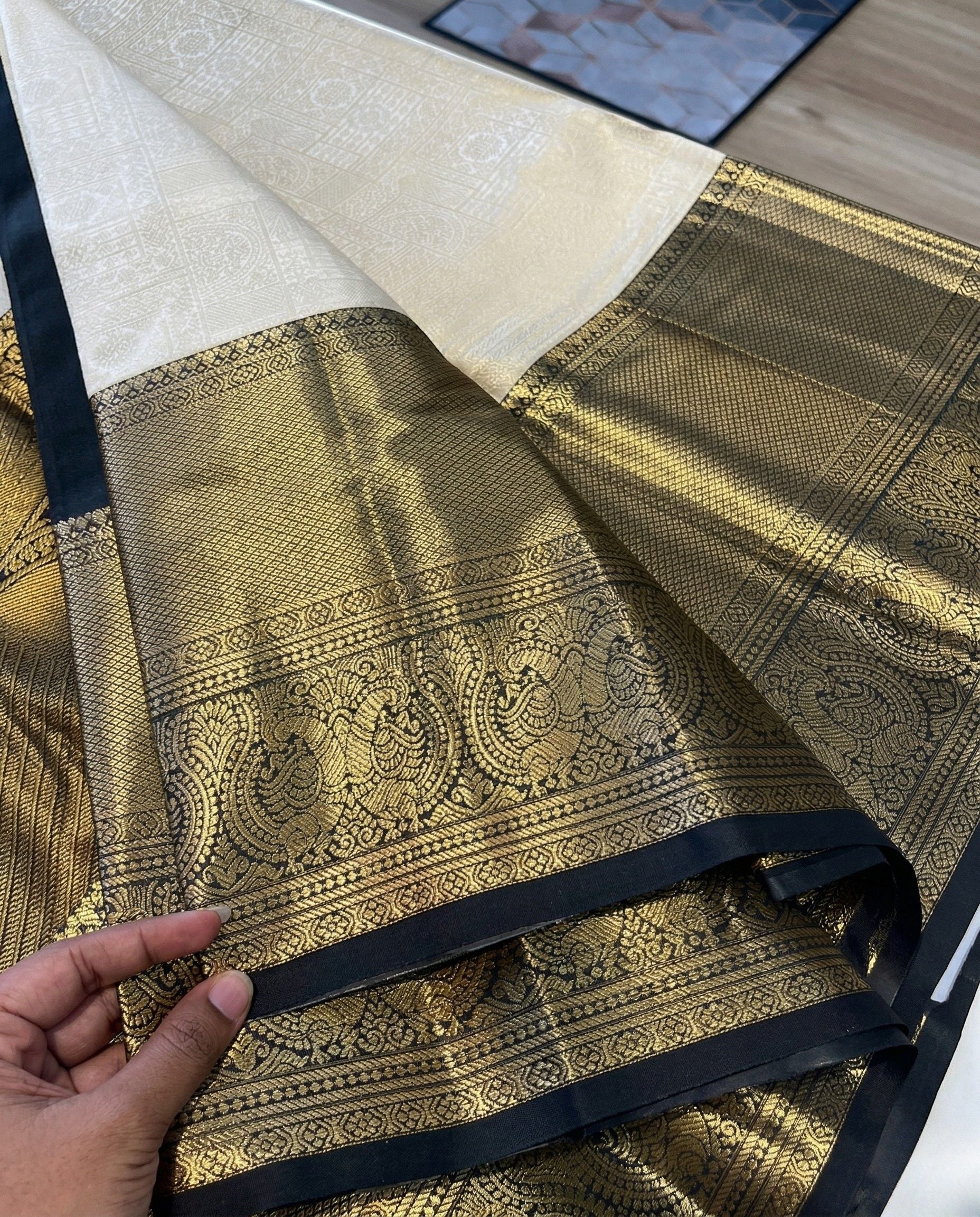 Nirmayi - Elegant Ivory Kanjivaram Inspired Saree with Grand Zari Pallu