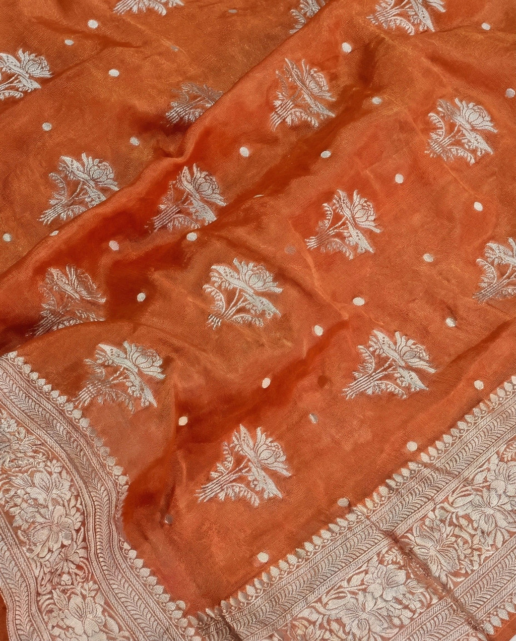 Roshni - Rust Orange Handwoven Tissue Georgette Saree with Silver Zari Floral Border