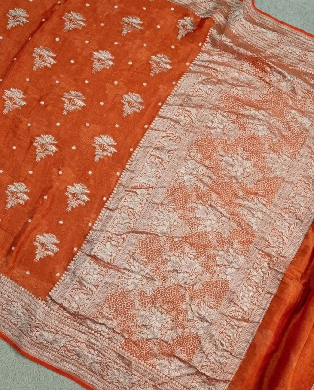 Roshni - Rust Orange Handwoven Tissue Georgette Saree with Silver Zari Floral Border