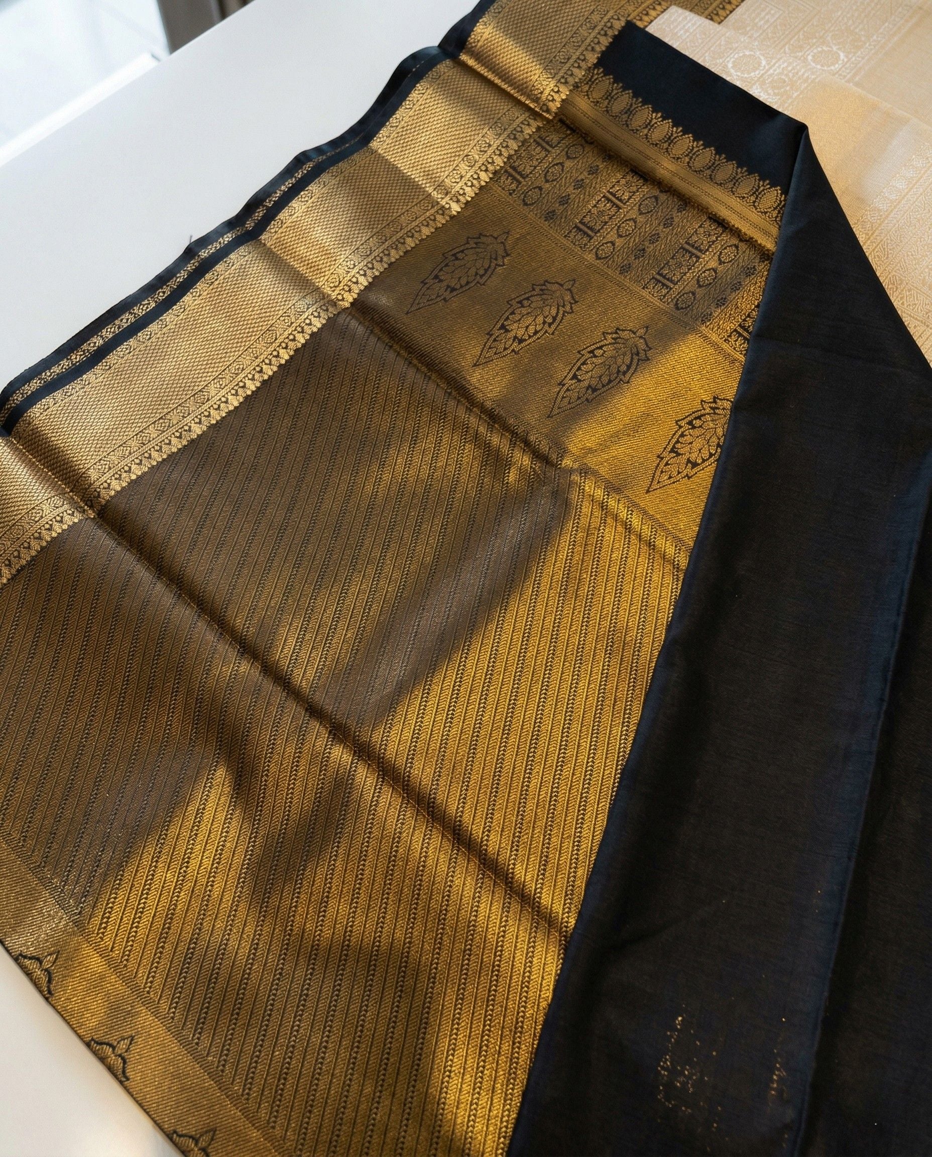 Nirmayi - Elegant Ivory Kanjivaram Inspired Saree with Grand Zari Pallu