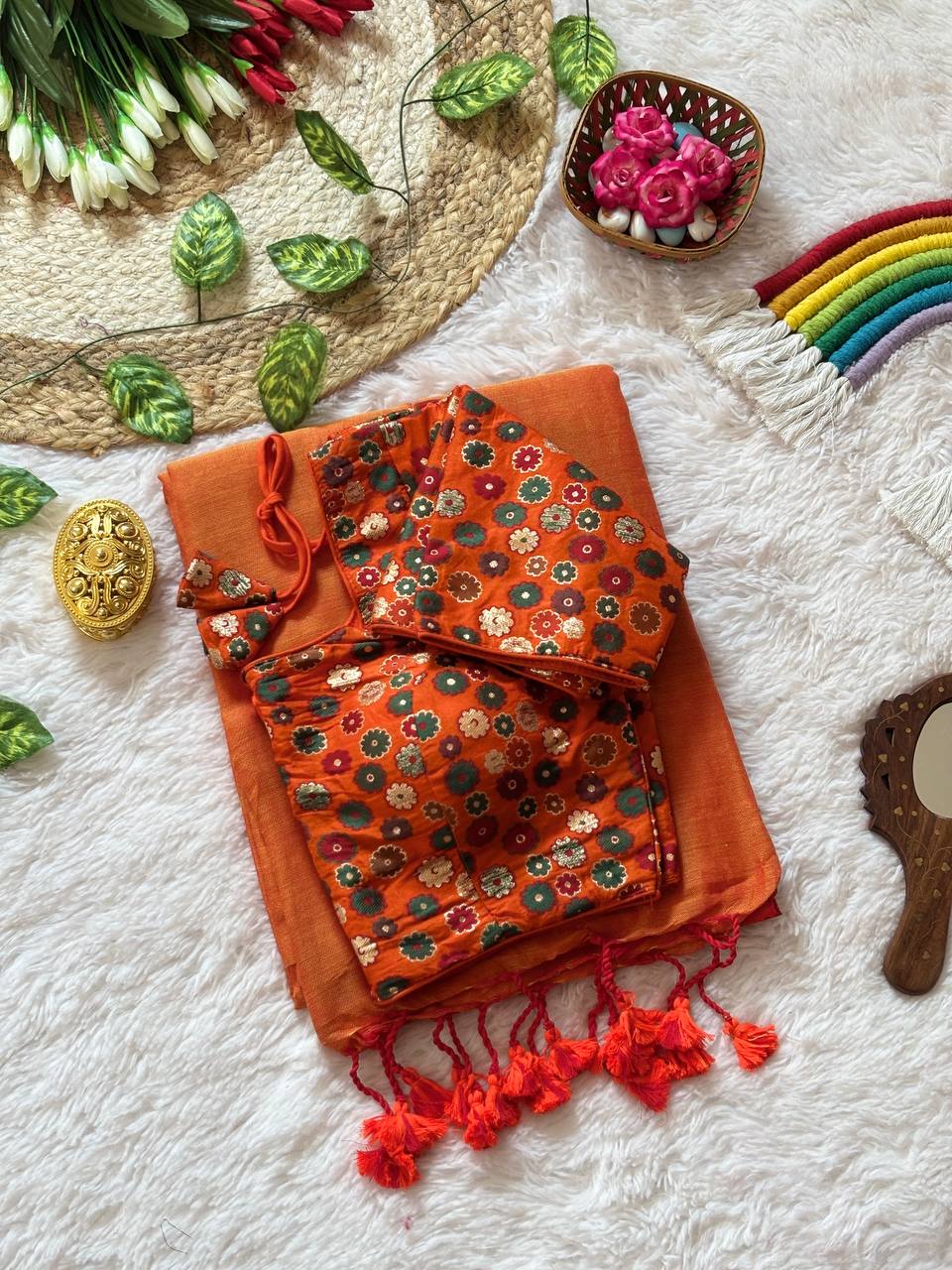 Rust Orange Mull Cotton Saree with Red Tassels & Multicolor Floral Brocade Blouse