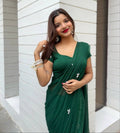 Bottle Green Handwork Cut Dana Georgette Dinner Saree with Silver Border