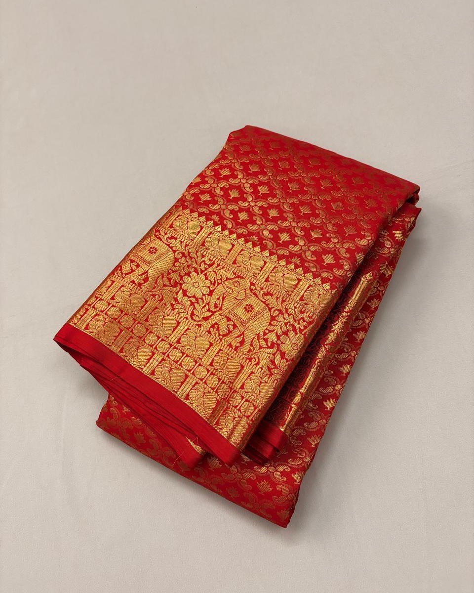 Bhairavi – Temple Red Banarasi Soft Silk Saree with Elephant Zari Border & Paisley Pallu