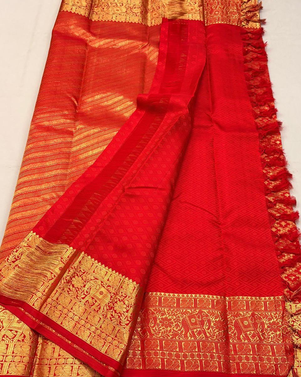 Bhairavi – Temple Red Banarasi Soft Silk Saree with Elephant Zari Border & Paisley Pallu