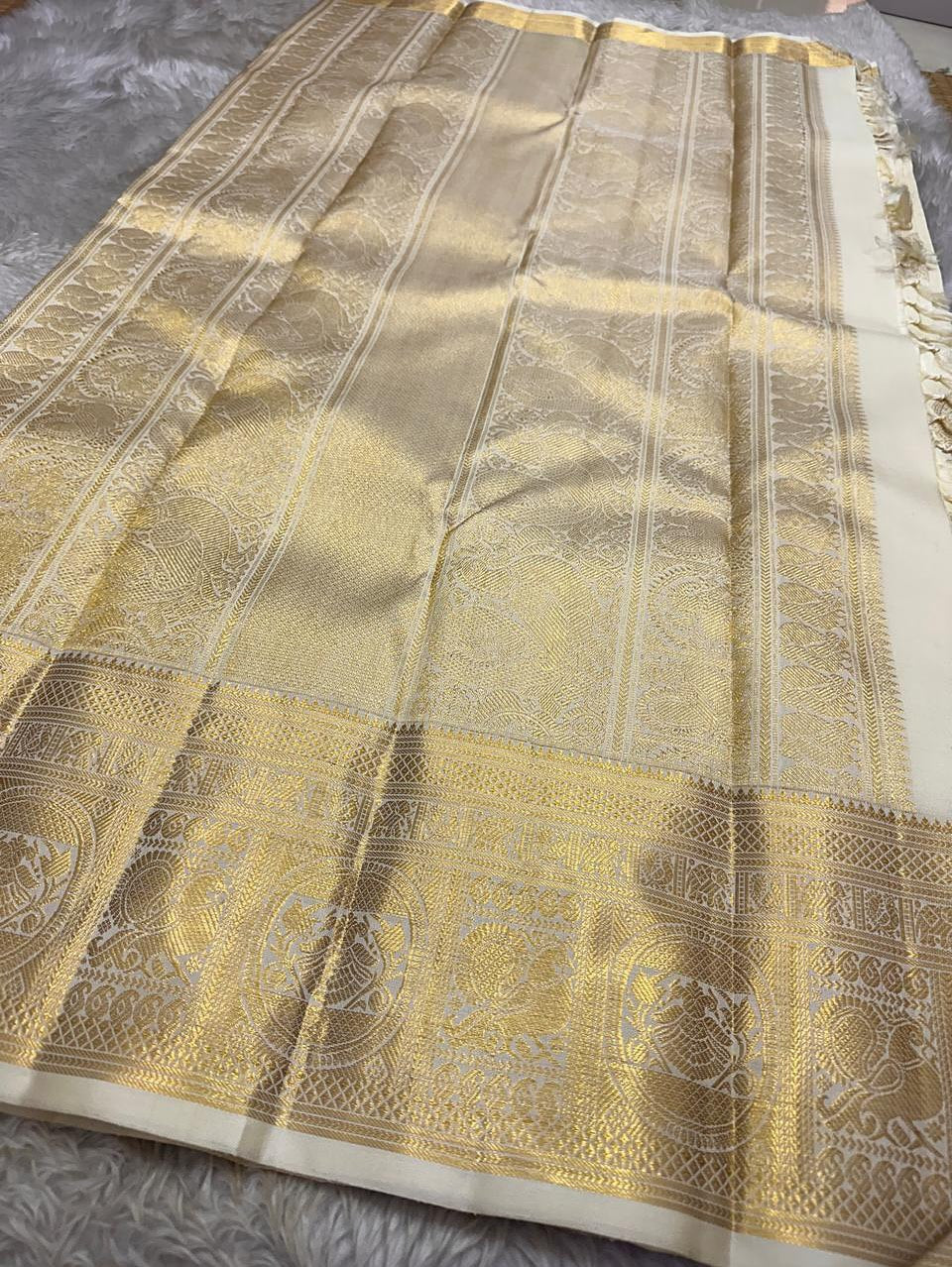 Dakshayani – Off White Banarasi Soft Silk Saree with Gold Zari Butti & Grand Border